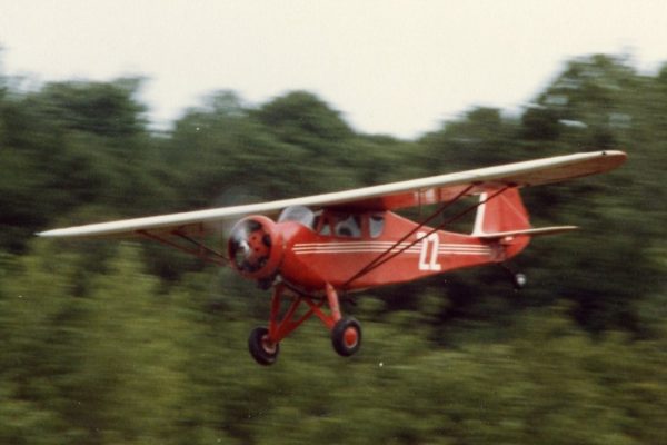 photo of a Monocoupe 90 in flight