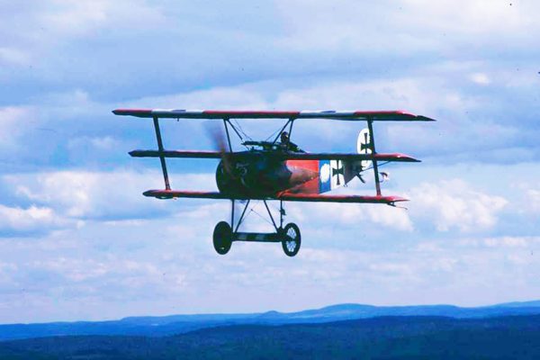 a photo of a Dr. 1 triplane in flight